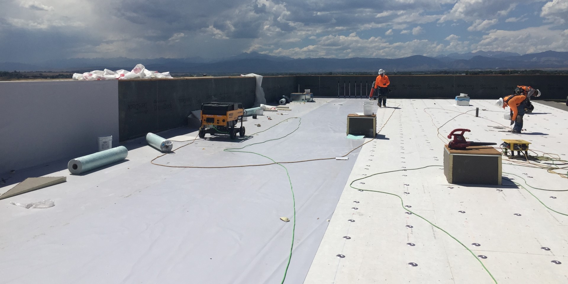 Workers on a Roof